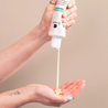 Curly Defining Conditioner being applied to palm