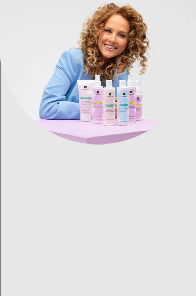 Denise Walsh, founder of Curly Co alongside her products
